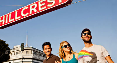 3 San Diegan's under the Hillcrest sign